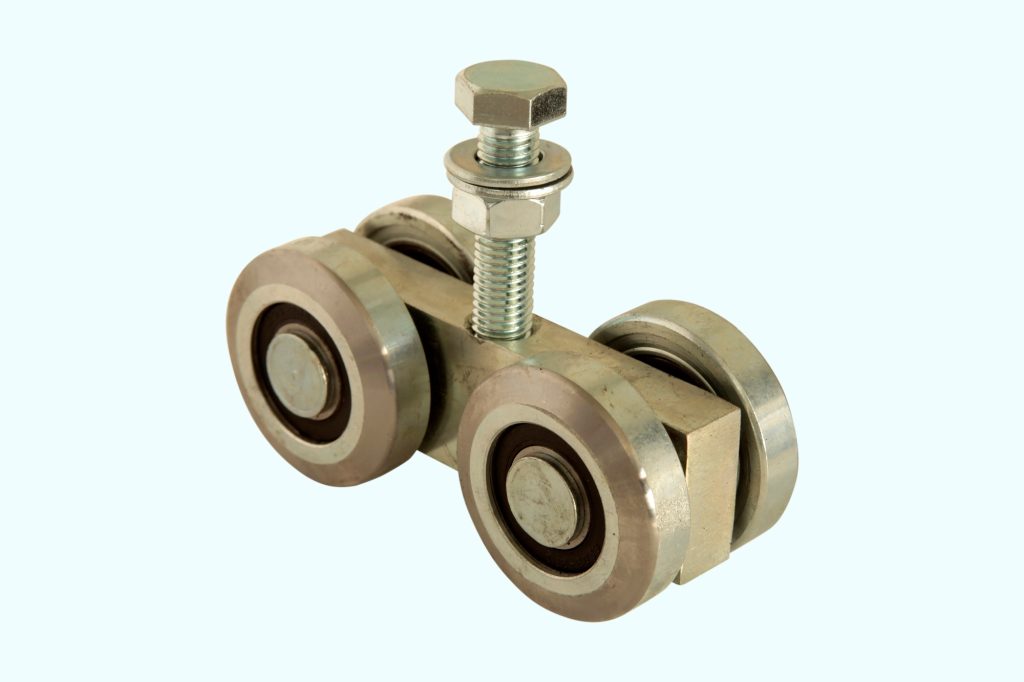 Accessories for sliding gates. Guide carriage. Roller for sliding gates