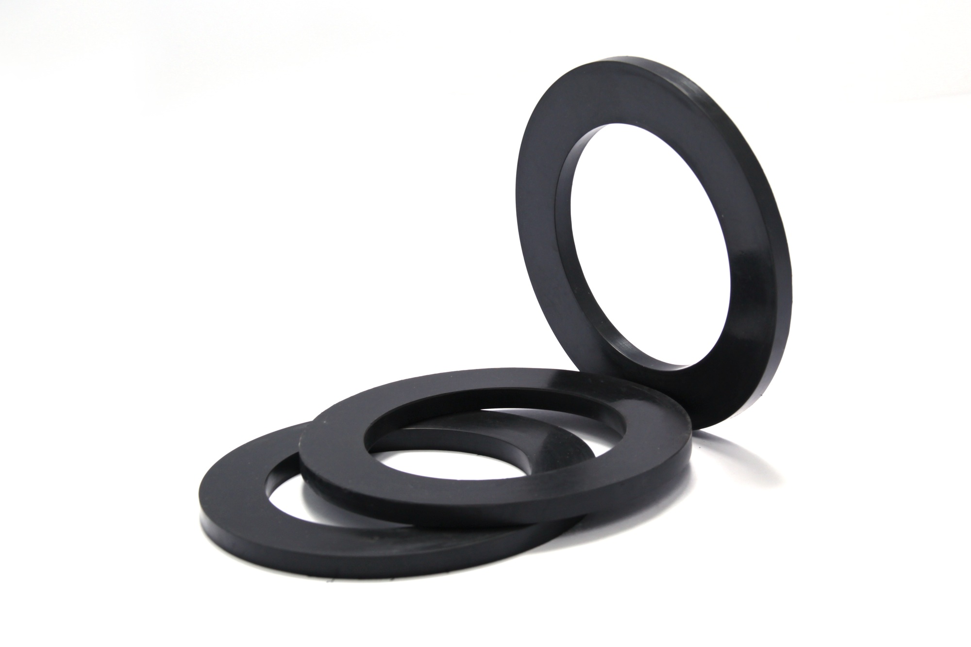 Pile of rubber gaskets and washers isolated on white. High quality photo